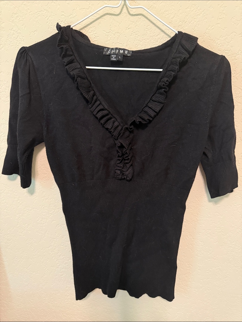 CHROME Black Short-Sleeve Ruffle V-Neck Knit Top